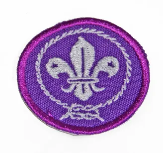 Lilijka haftowana WOSM - plakietka